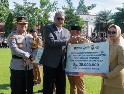 Kapolres  Kolaborasi dengan BRI Cabang Jombang Salurkan Bantuan TJSL Berupa Mesin Pengering Jagung untuk Para Petani